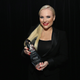 Meghan McCain seen here holding the Not A Jewish Person Of The Year award.